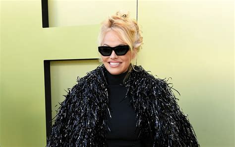 pamela versace trav|Pamela Anderson Holds Court in Fringe Coat & Pumps at .